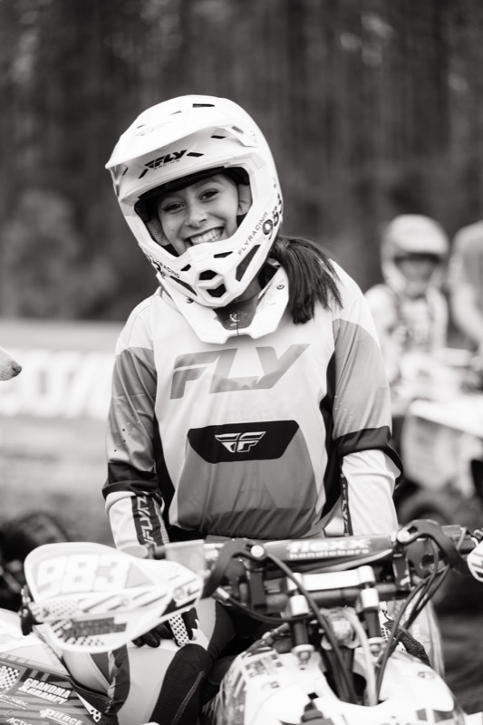 Andrea Rodgers portrait — race day, FLY Racing gear #983
